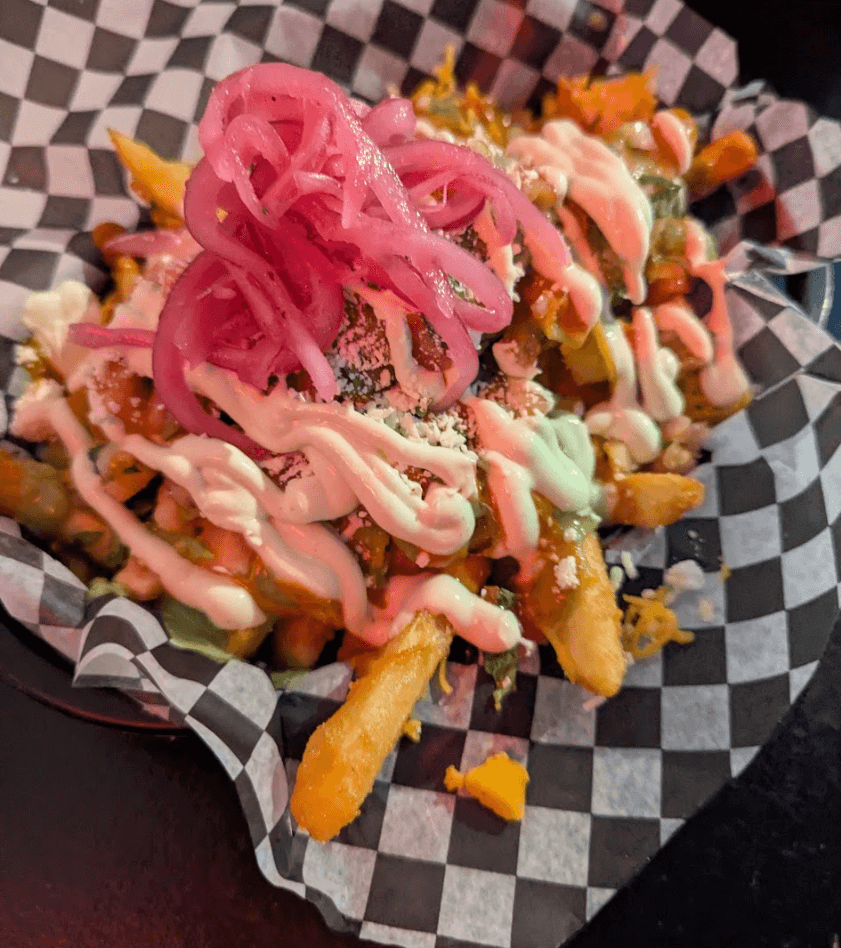 Asada Fries from Torta Boyz with crispy breaded fries and assorted toppings