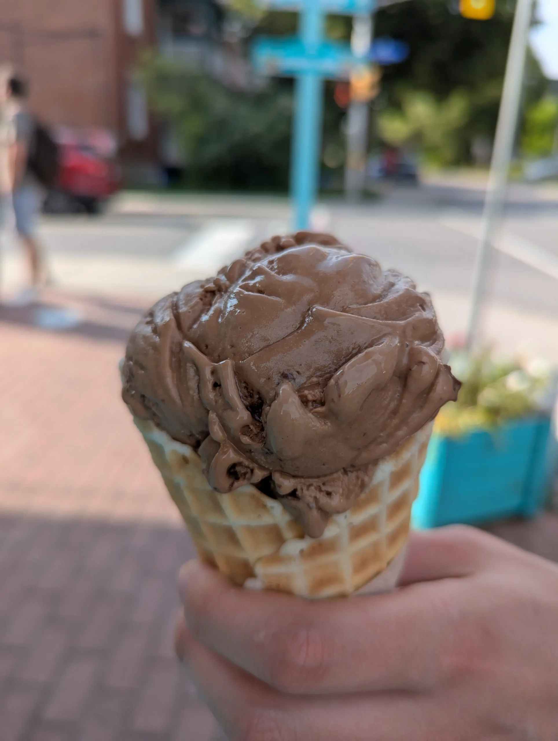 Coffee ice cream from the merry dairy on waffle cone