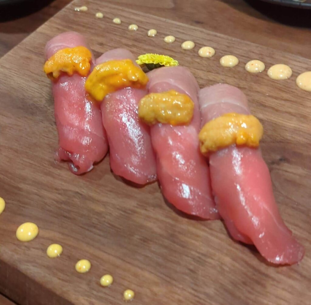 Tuna Nigiri with Uni from shinka sushi bar.