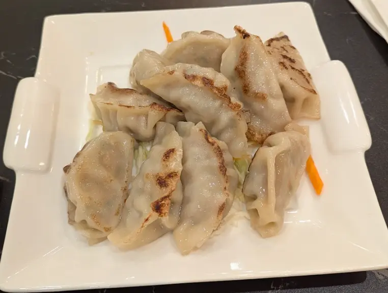 Pan Fried Chicken Dumplings from Wok & Chop