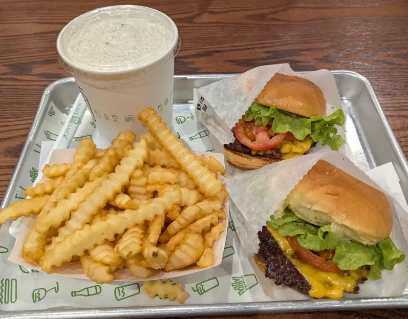 ShackBurger, Crinkle-Cut Fries, and Cookies and Cream Milkshake from Shake Shack
